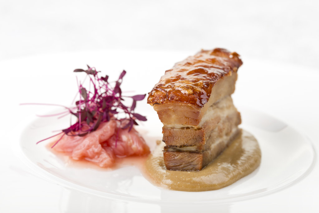 Pork Belly on a white background with a rhubarb sauce Food photography Liverpool, Food Photographer Liverpool, Patricia Niland www.niland.photography, Food Photographer Manchester, Restaurant photographer