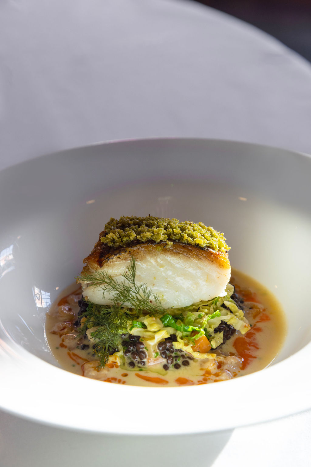 Food Photography of a dish of crusted Fish at The Art School Restaurant shot in the autumn sunlight Liverpool Photography for restaurants
